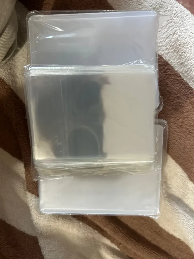 Buyer photo from a verified 50 toploaders + 100 sleeves combo order